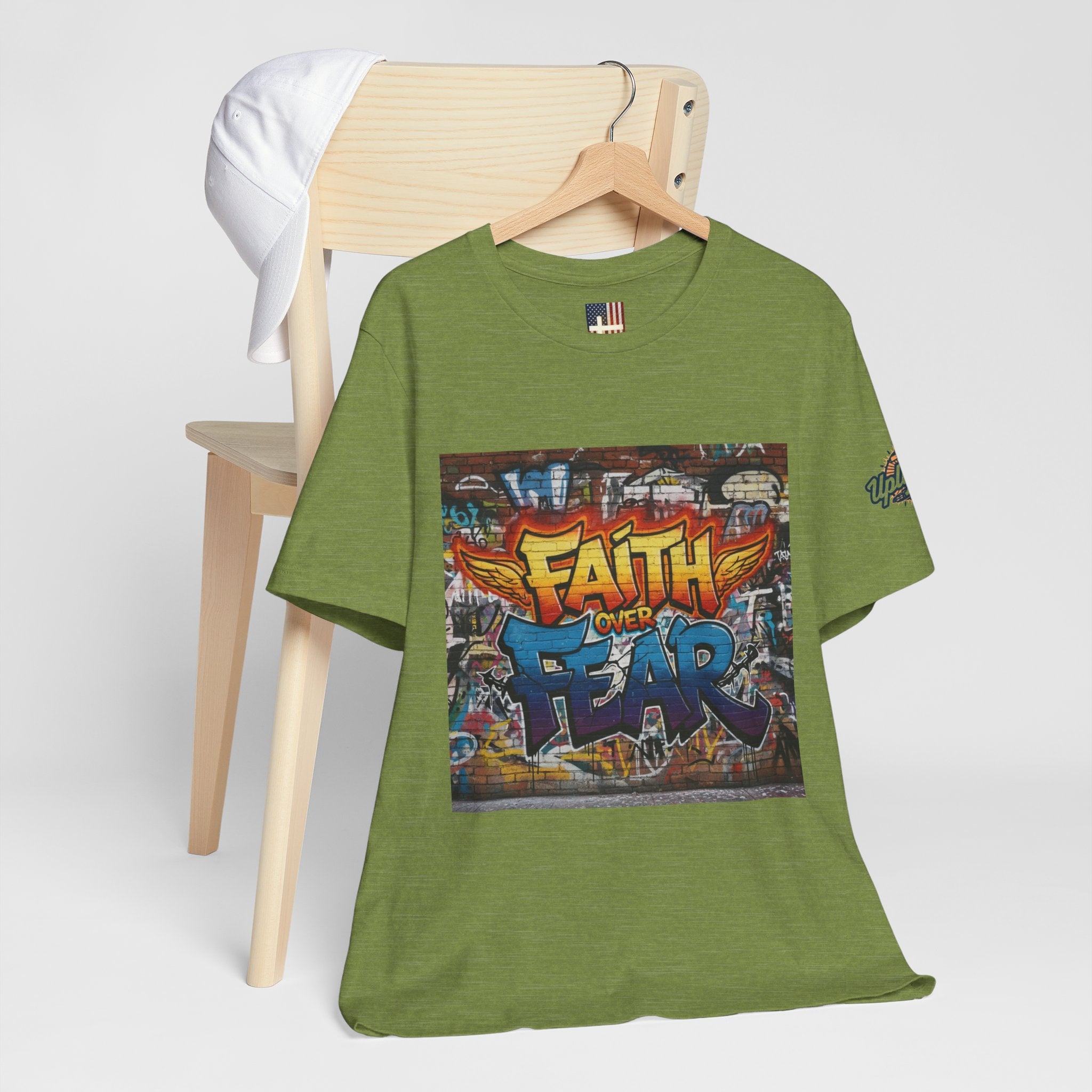 Faith Over Fear T-shirt – Graffiti Wall Christian T-shirt for Bold 2 Corinthians 5:7 Streetwear & Unshakable Faith Printify