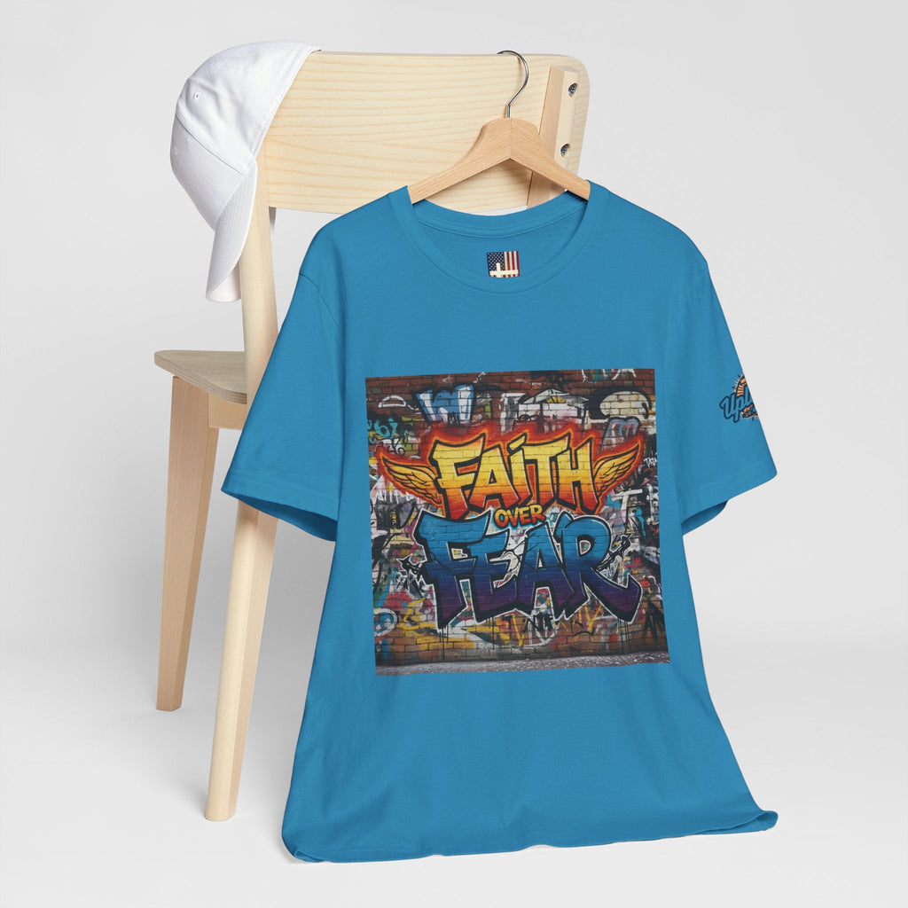 Faith Over Fear T-shirt – Graffiti Wall Christian T-shirt for Bold 2 Corinthians 5:7 Streetwear & Unshakable Faith Printify