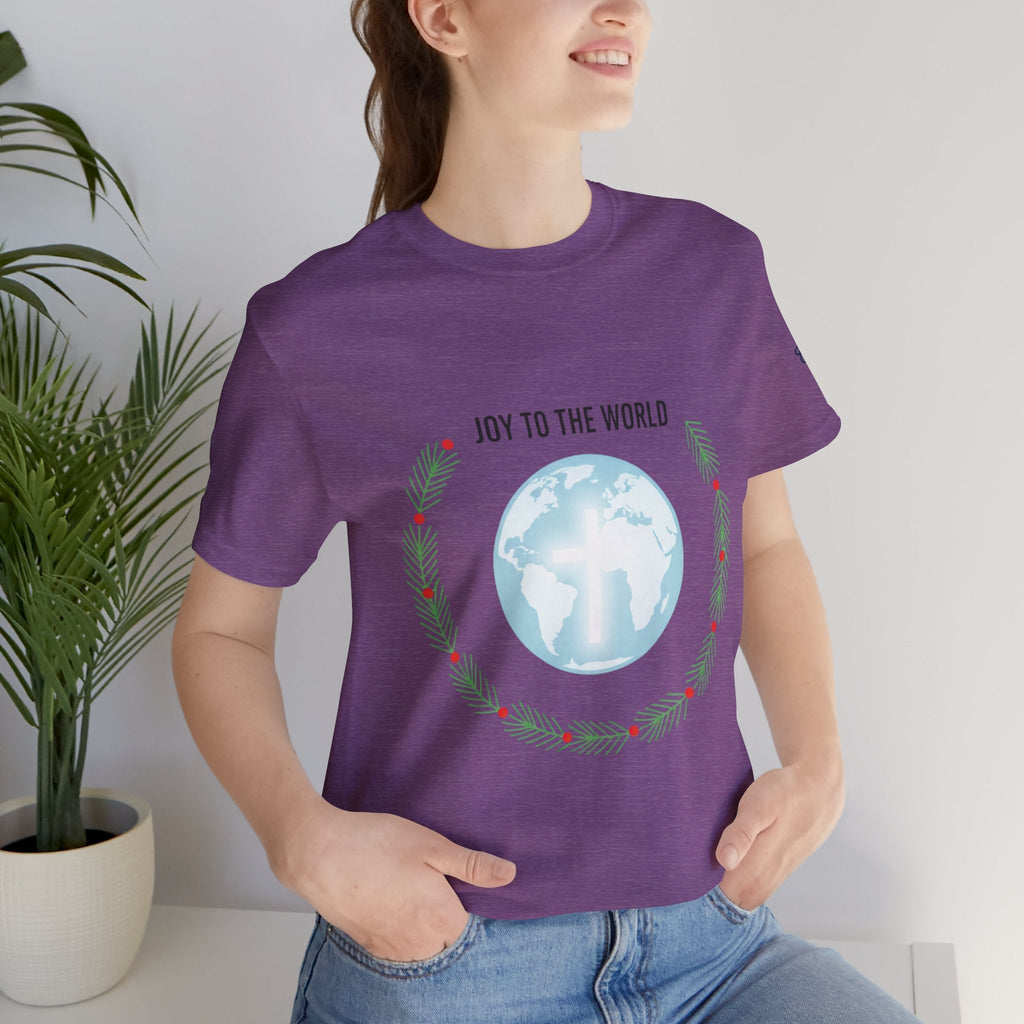 Joy to the World T-shirt – Wreath Earth Nativity Christian Christmas T-shirt for Isaiah 9:6 Holiday Faith & Festive Joy Printify