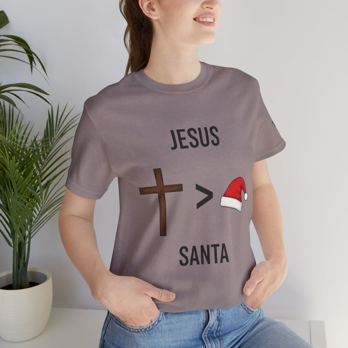 🎄 Jesus > Santa – Minimalist Christian Christmas T-Shirt | Bold Faith Over Holiday Tee | Cross vs Santa Hat Design | Uplifted Gear Printify