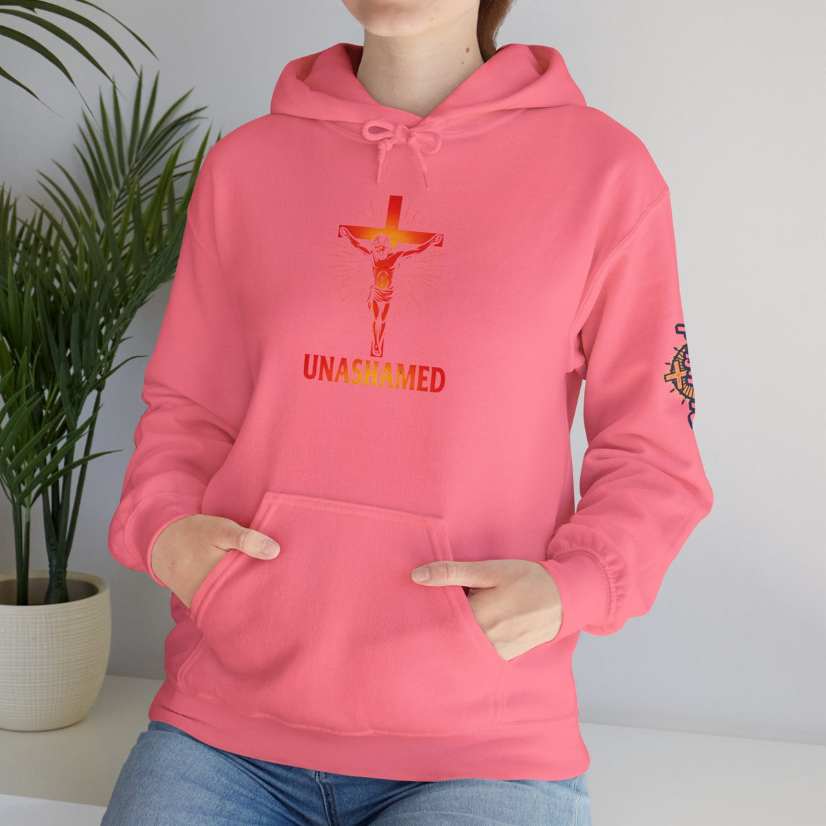 Unashamed Hoodie – Romans 1:16 Crucifixion Christian Sweatshirt for Bold Unwavering Faith Printify