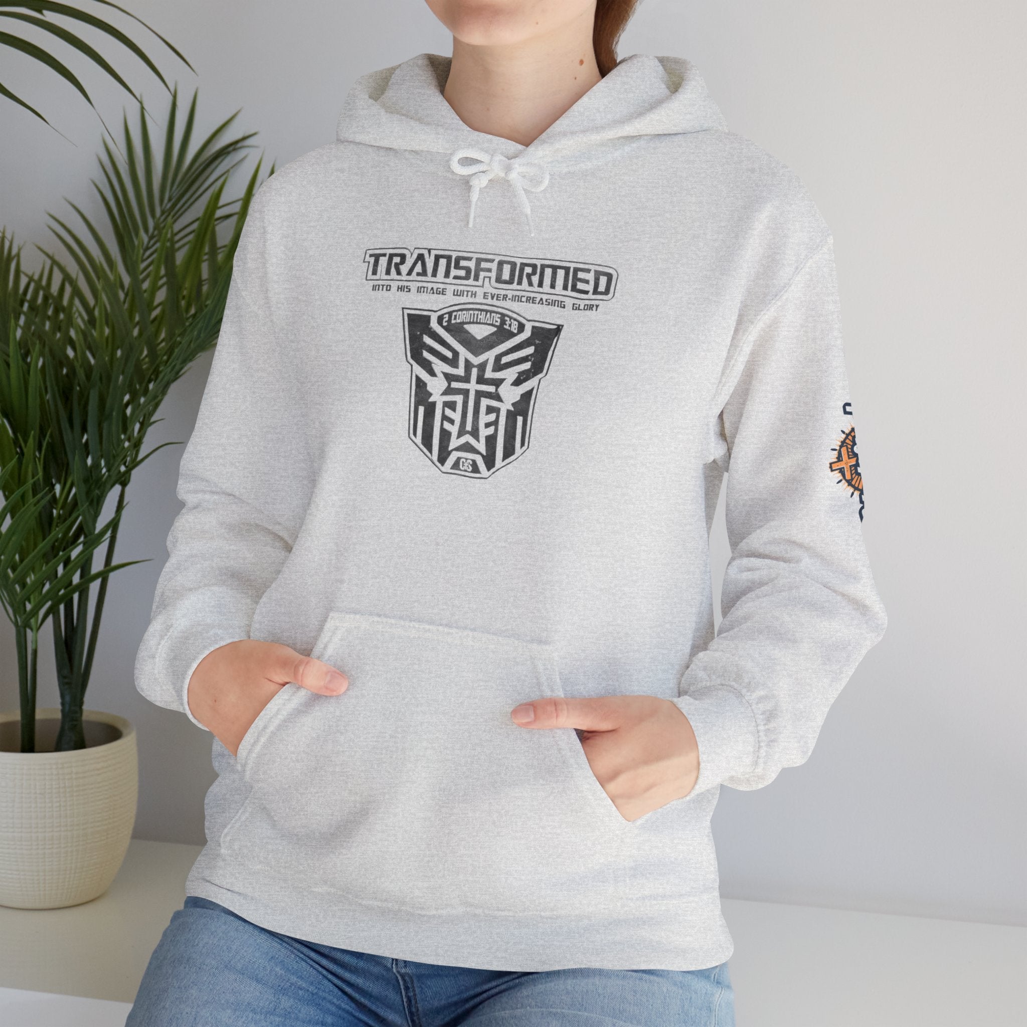 Transformer Logo Christian Hoodie | 2 Corinthians 3:18 Bible Verse Hoodie Printify
