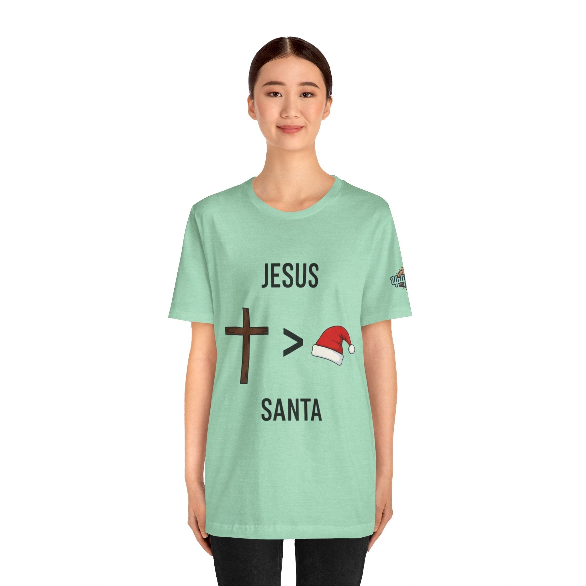 🎄 Jesus > Santa – Minimalist Christian Christmas T-Shirt | Bold Faith Over Holiday Tee | Cross vs Santa Hat Design | Uplifted Gear Printify