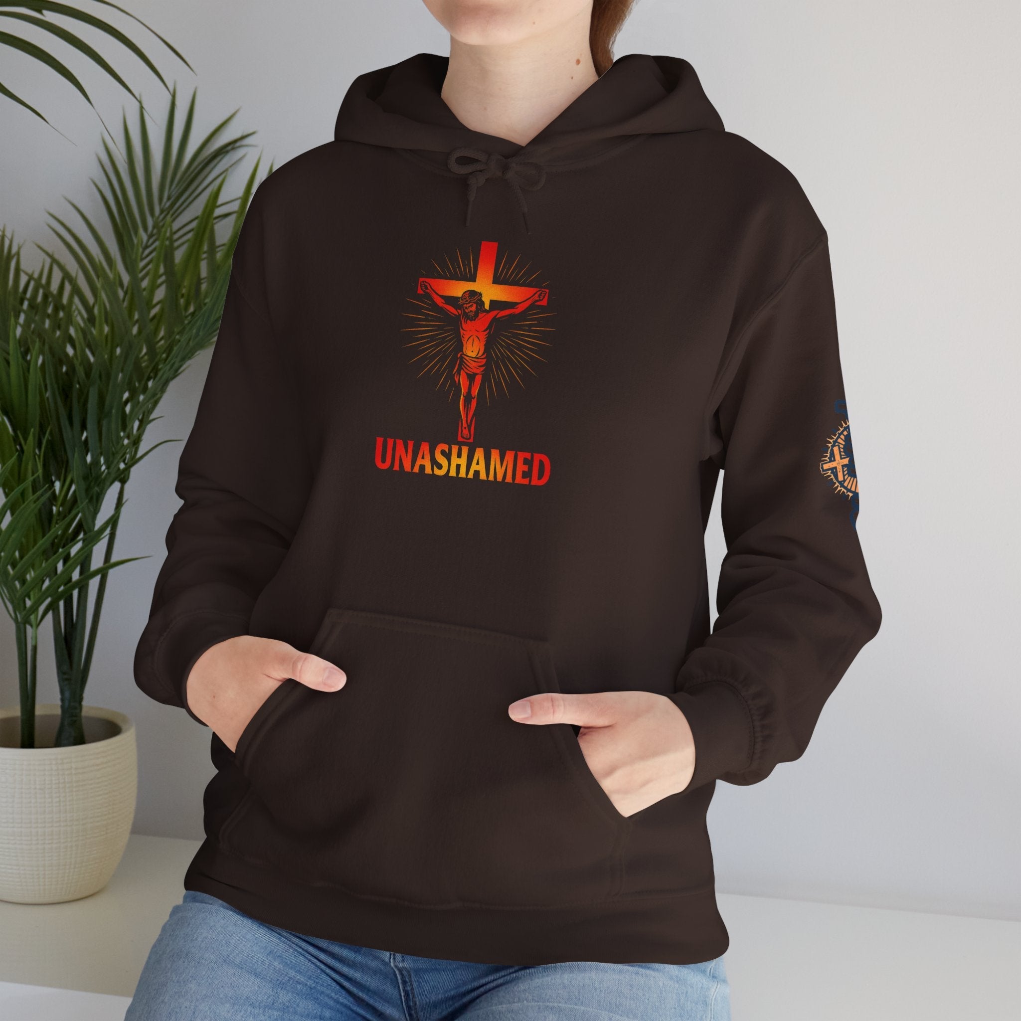 Unashamed Hoodie – Romans 1:16 Crucifixion Christian Sweatshirt for Bold Unwavering Faith Printify