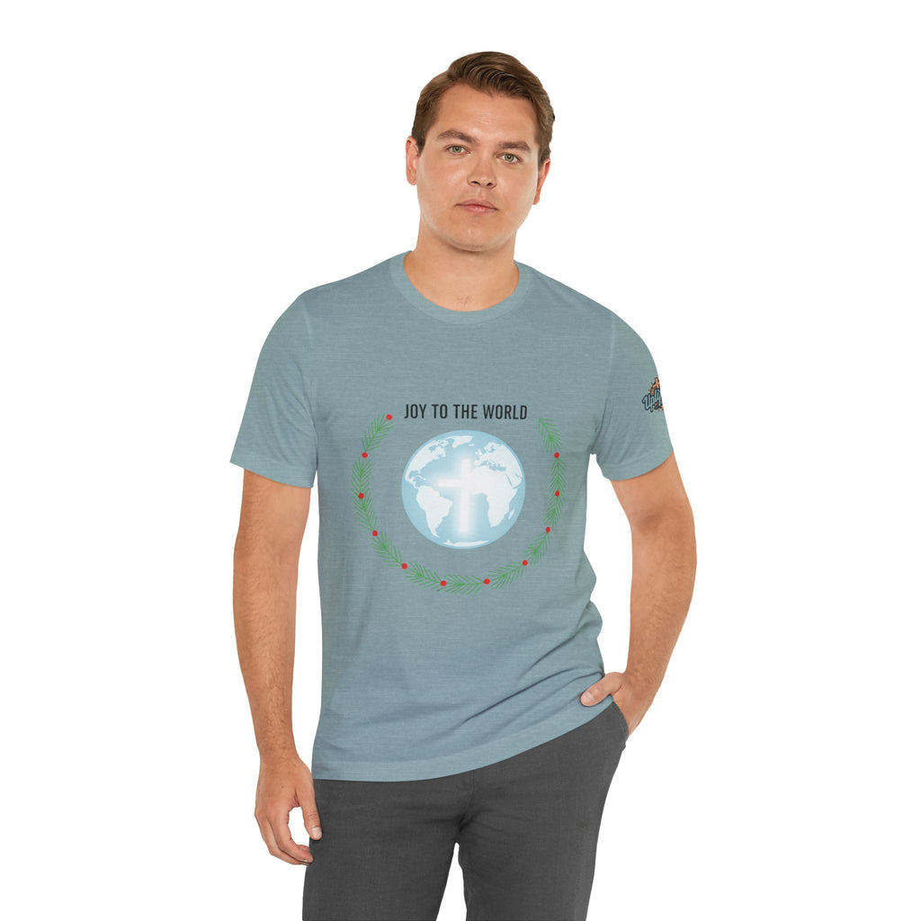 Joy to the World T-shirt – Wreath Earth Nativity Christian Christmas T-shirt for Isaiah 9:6 Holiday Faith & Festive Joy Printify