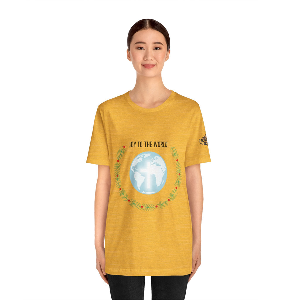 Joy to the World T-shirt – Wreath Earth Nativity Christian Christmas T-shirt for Isaiah 9:6 Holiday Faith & Festive Joy Printify