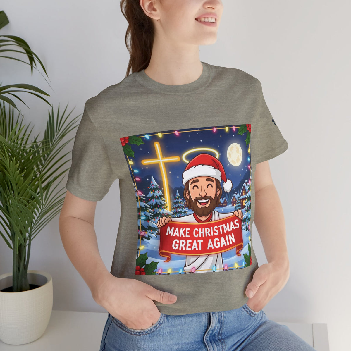 🎄 Make Christmas Great Again – Funny Christian T-Shirt | Jesus Holding Banner | Faith-Based Holiday Parody Tee | Uplifted Gear Printify