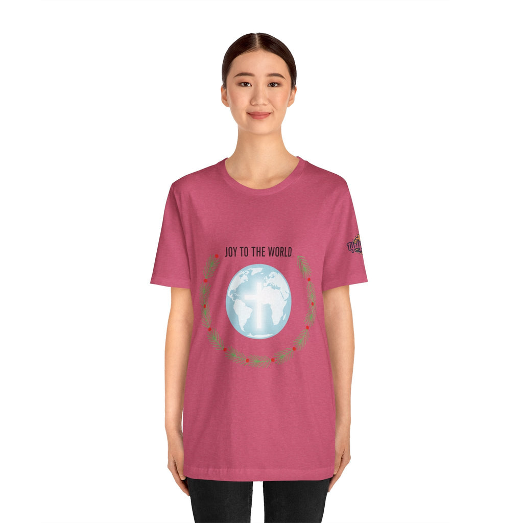 Joy to the World T-shirt – Wreath Earth Nativity Christian Christmas T-shirt for Isaiah 9:6 Holiday Faith & Festive Joy Printify