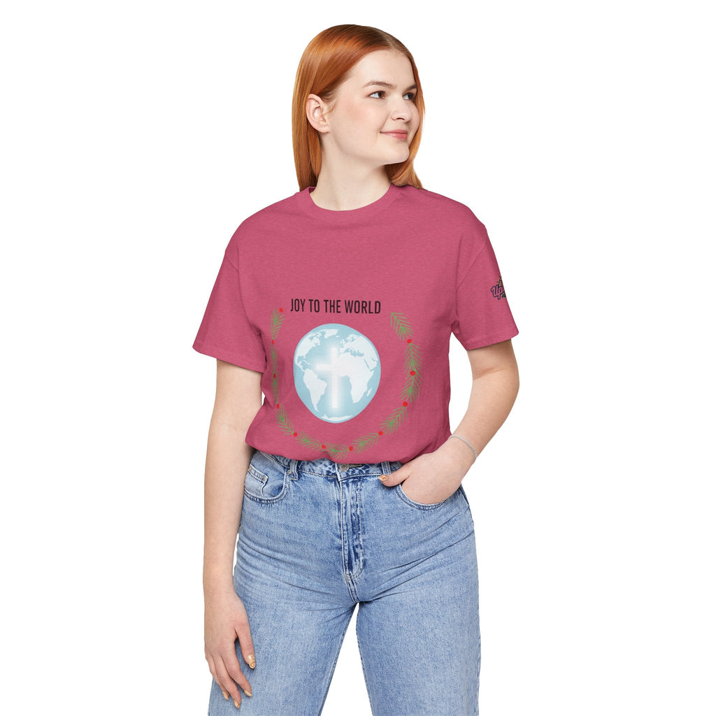 Joy to the World T-shirt – Wreath Earth Nativity Christian Christmas T-shirt for Isaiah 9:6 Holiday Faith & Festive Joy Printify