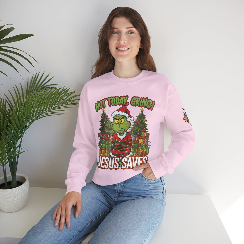 🎄 Not Today, Grinch – Jesus Saves | Funny Christian Christmas Sweatshirt | Sulking Grinch & Glowing Cross | Bold Neon Faith Tee by Uplifted Gear Printify