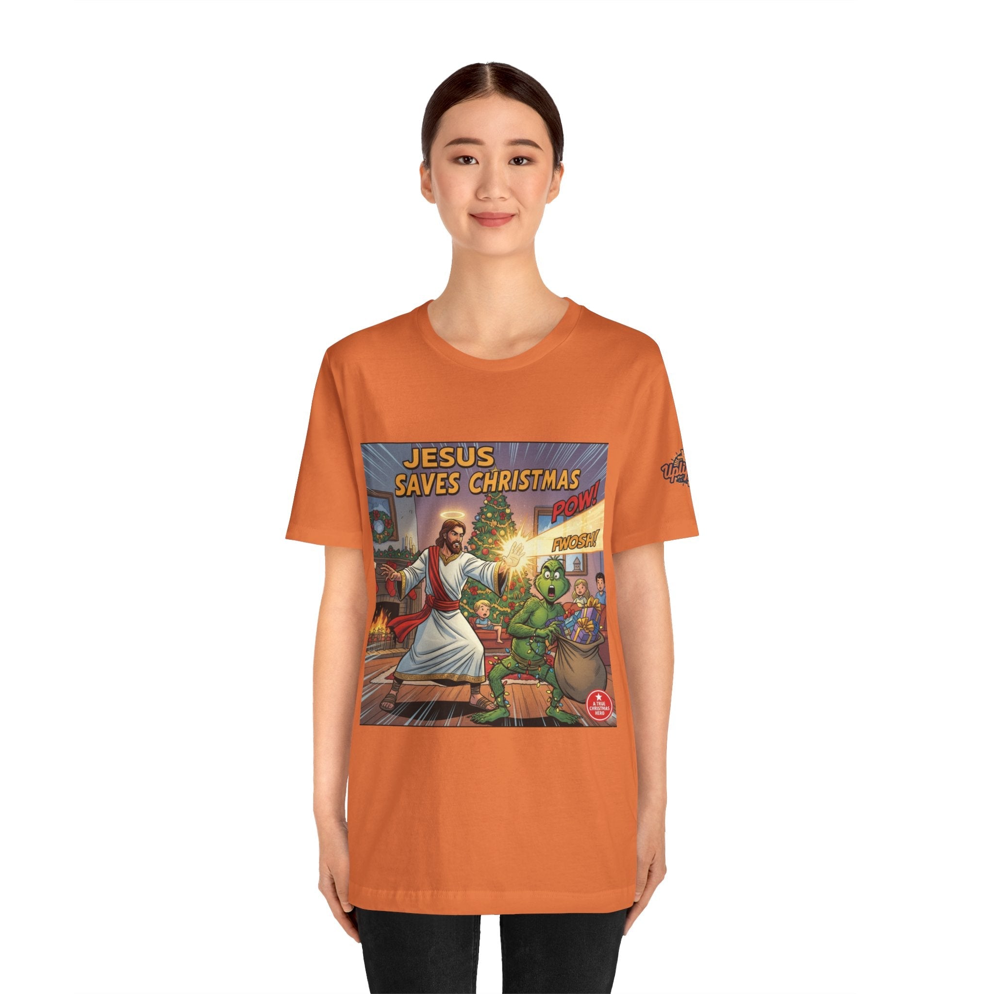 Jesus Saves Christmas T-shirt – Grinch vs Savior Light Battle Christian T-shirt for Hilarious Holiday Faith & True Joy Printify