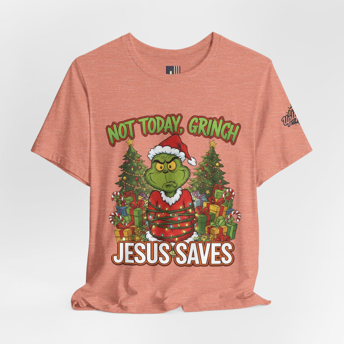 🎄 Not Today, Grinch – Jesus Saves | Funny Christian Christmas T-Shirt | Sulking Grinch & Glowing Cross | Bold Neon Faith Tee by Uplifted Gear Printify
