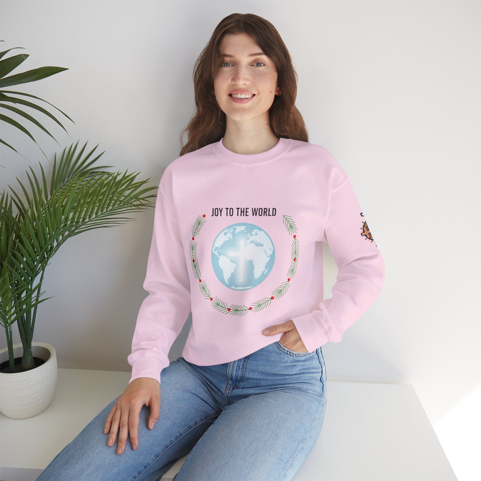 Joy to the World Sweatshirt – Wreath Earth Nativity Christian Christmas Sweatshirt for Isaiah 9:6 Holiday Faith & Festive Joy Printify