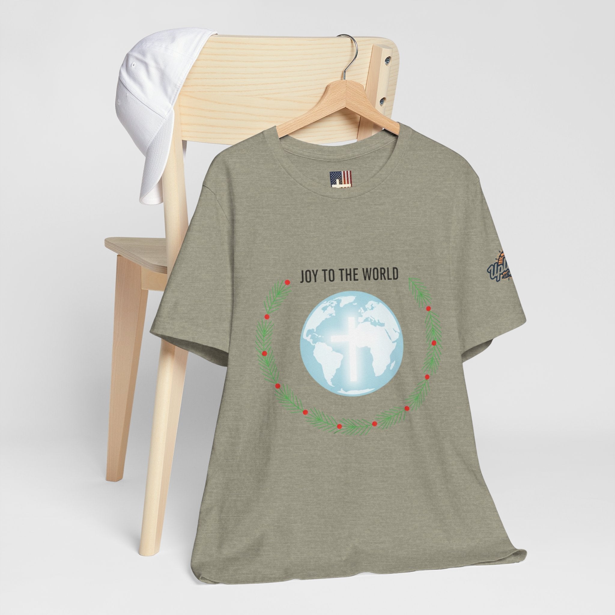 Joy to the World T-shirt – Wreath Earth Nativity Christian Christmas T-shirt for Isaiah 9:6 Holiday Faith & Festive Joy Printify