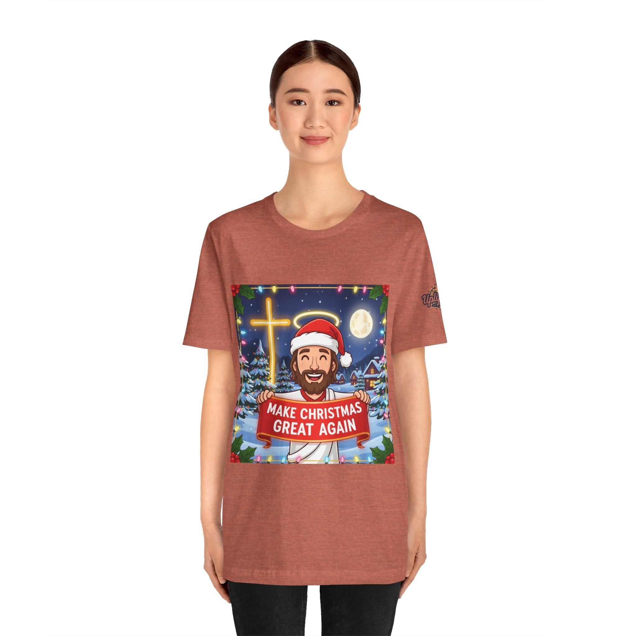 🎄 Make Christmas Great Again – Funny Christian T-Shirt | Jesus Holding Banner | Faith-Based Holiday Parody Tee | Uplifted Gear Printify