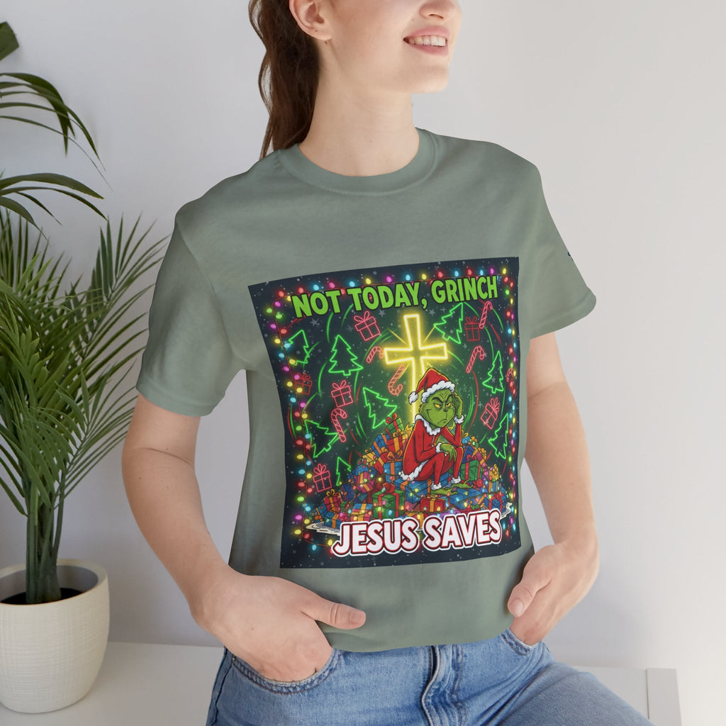 🎄 Not Today, Grinch – Jesus Saves | Funny Christian Christmas T-Shirt | Festive Green & Red Cartoon Style | Bold Faith Holiday Tee by Uplifted Gear Printify