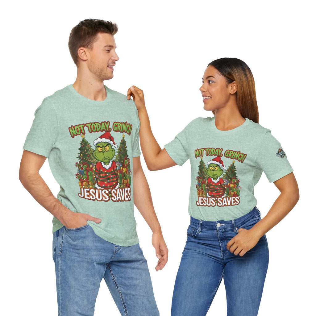 🎄 Not Today, Grinch – Jesus Saves | Funny Christian Christmas T-Shirt | Sulking Grinch & Glowing Cross | Bold Neon Faith Tee by Uplifted Gear Printify