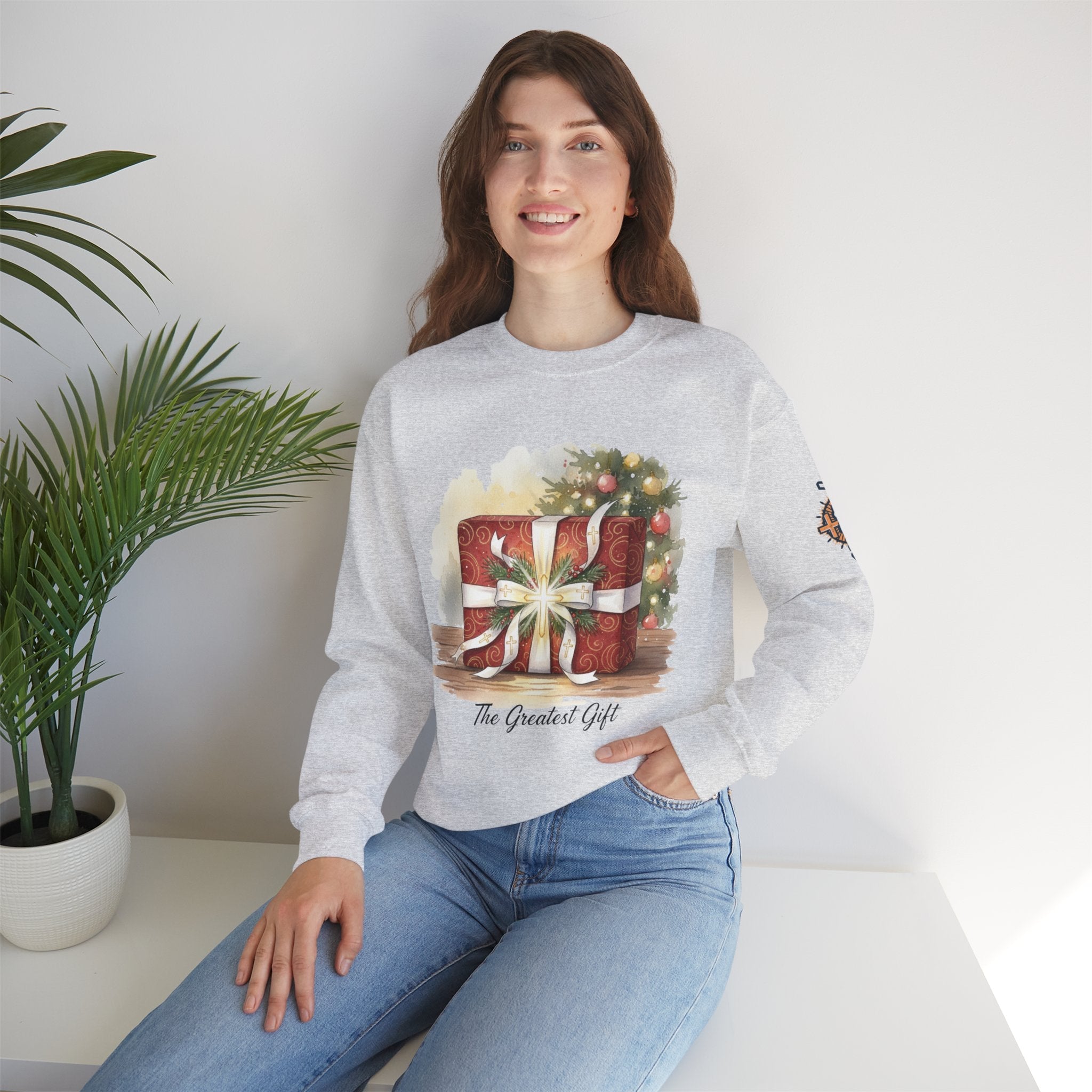 The Greatest Gift Sweatshirt – Cross Bow Present Christian Sweatshirt for Christmas Salvation & Eternal Faith Printify