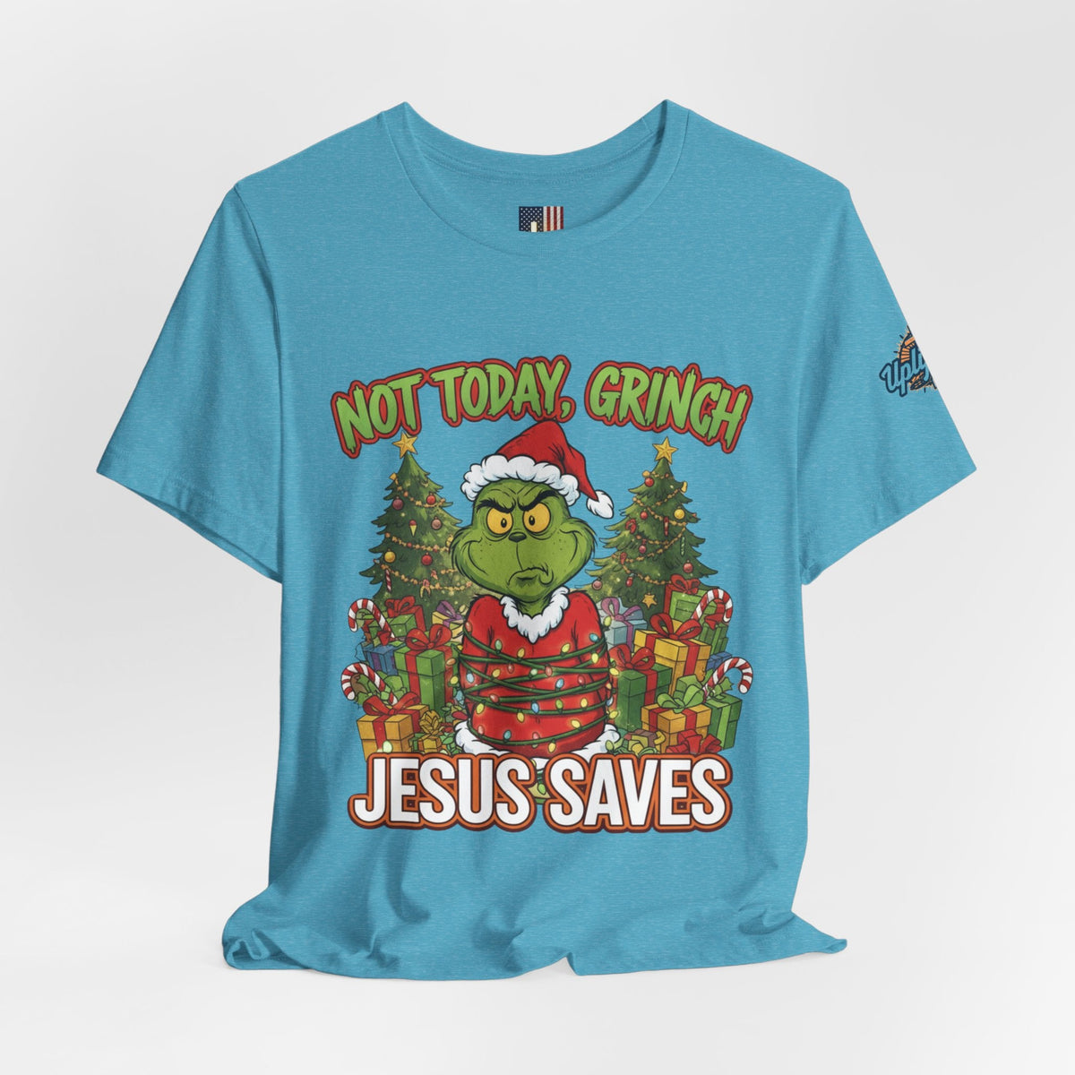 🎄 Not Today, Grinch – Jesus Saves | Funny Christian Christmas T-Shirt | Sulking Grinch & Glowing Cross | Bold Neon Faith Tee by Uplifted Gear Printify