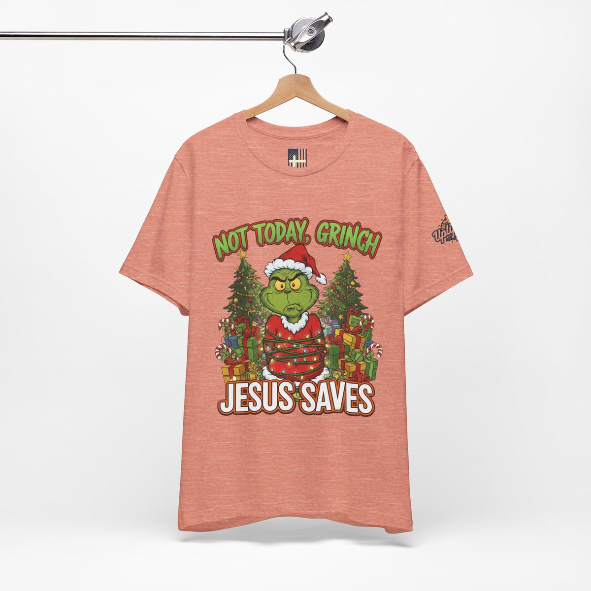 🎄 Not Today, Grinch – Jesus Saves | Funny Christian Christmas T-Shirt | Sulking Grinch & Glowing Cross | Bold Neon Faith Tee by Uplifted Gear Printify