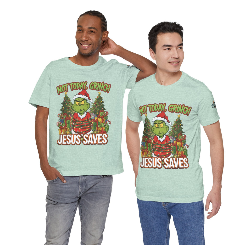 🎄 Not Today, Grinch – Jesus Saves | Funny Christian Christmas T-Shirt | Sulking Grinch & Glowing Cross | Bold Neon Faith Tee by Uplifted Gear Printify