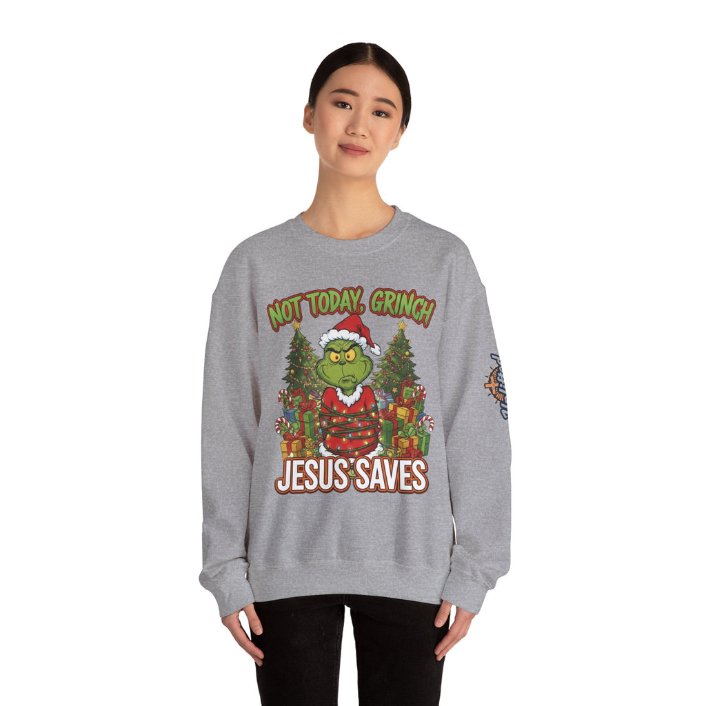 🎄 Not Today, Grinch – Jesus Saves | Funny Christian Christmas Sweatshirt | Sulking Grinch & Glowing Cross | Bold Neon Faith Tee by Uplifted Gear Printify