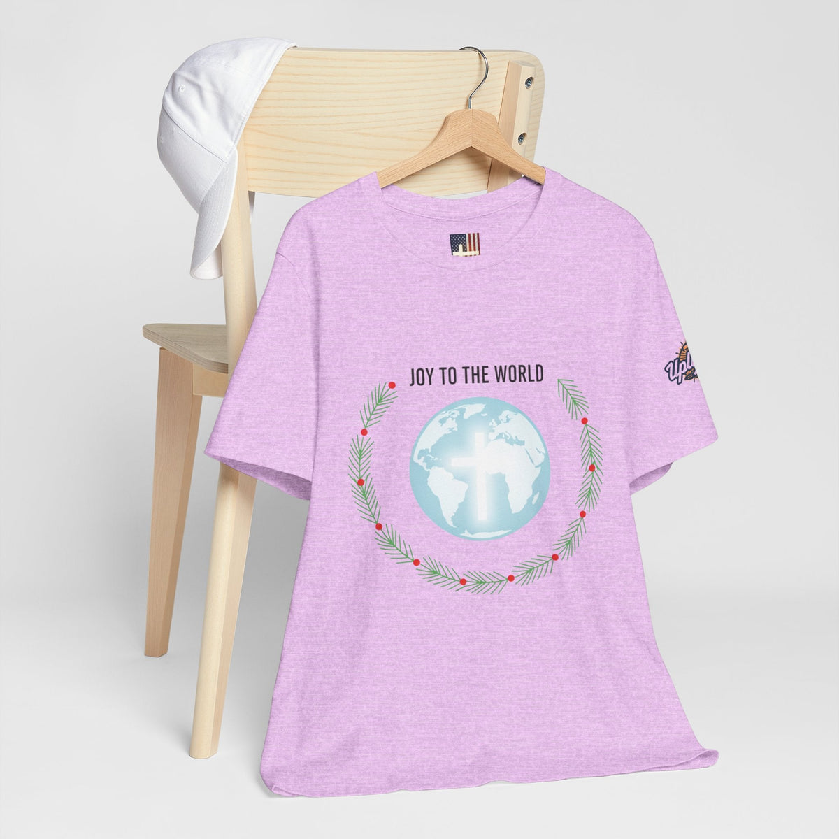 Joy to the World T-shirt – Wreath Earth Nativity Christian Christmas T-shirt for Isaiah 9:6 Holiday Faith & Festive Joy Printify