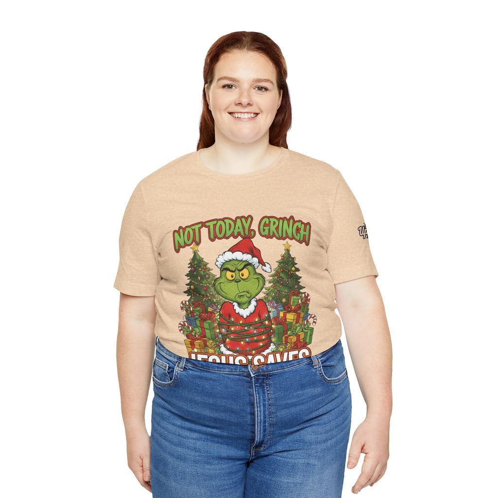 🎄 Not Today, Grinch – Jesus Saves | Funny Christian Christmas T-Shirt | Sulking Grinch & Glowing Cross | Bold Neon Faith Tee by Uplifted Gear Printify