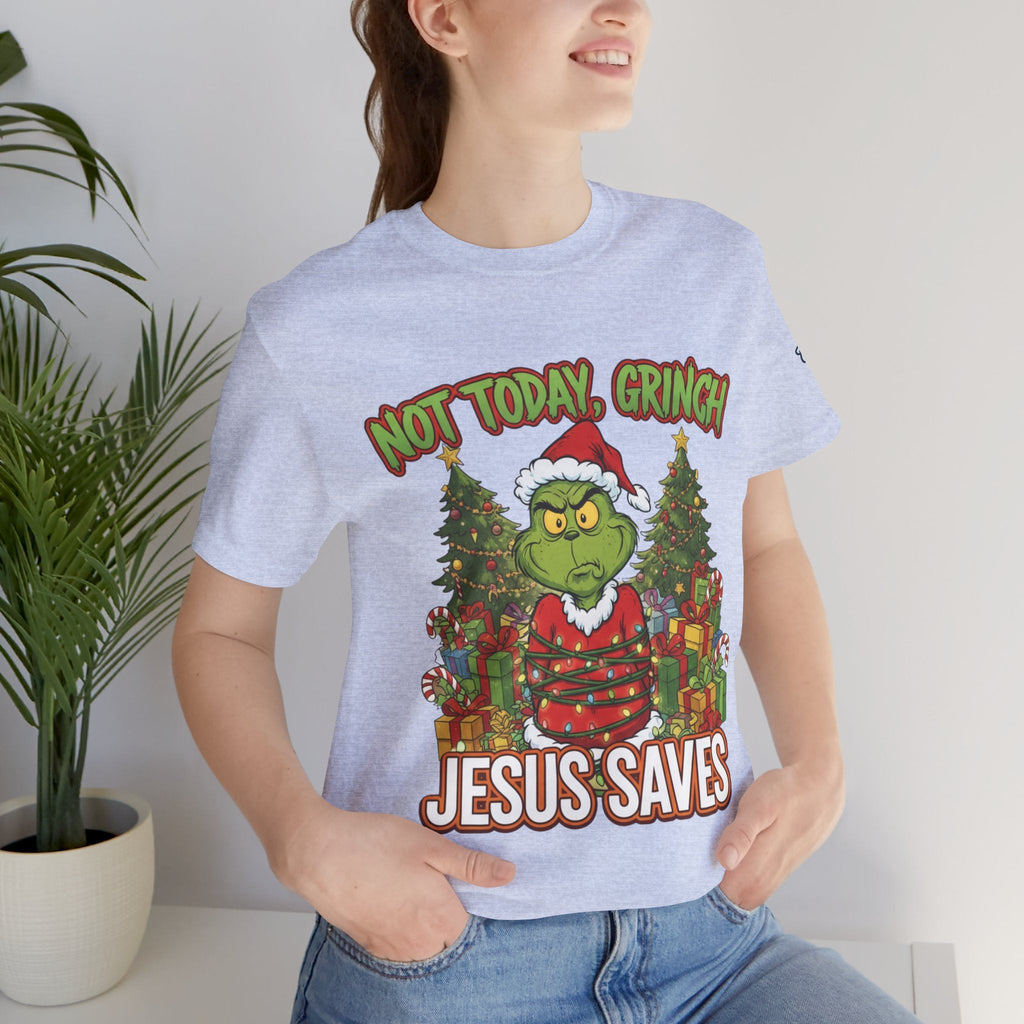 🎄 Not Today, Grinch – Jesus Saves | Funny Christian Christmas T-Shirt | Sulking Grinch & Glowing Cross | Bold Neon Faith Tee by Uplifted Gear Printify