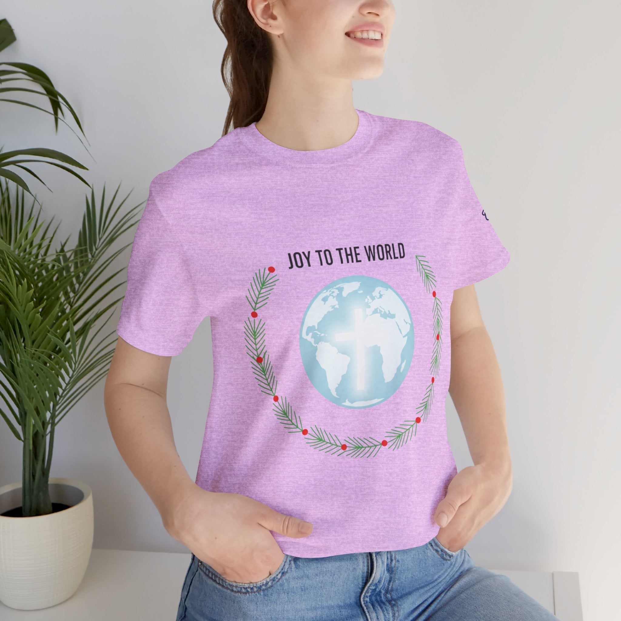 Joy to the World T-shirt – Wreath Earth Nativity Christian Christmas T-shirt for Isaiah 9:6 Holiday Faith & Festive Joy Printify