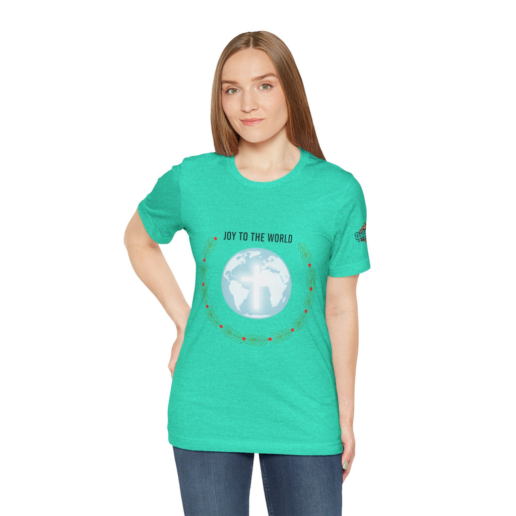 Joy to the World T-shirt – Wreath Earth Nativity Christian Christmas T-shirt for Isaiah 9:6 Holiday Faith & Festive Joy Printify