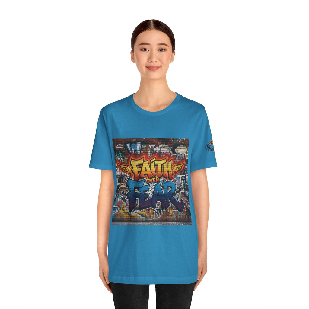 Faith Over Fear T-shirt – Graffiti Wall Christian T-shirt for Bold 2 Corinthians 5:7 Streetwear & Unshakable Faith Printify