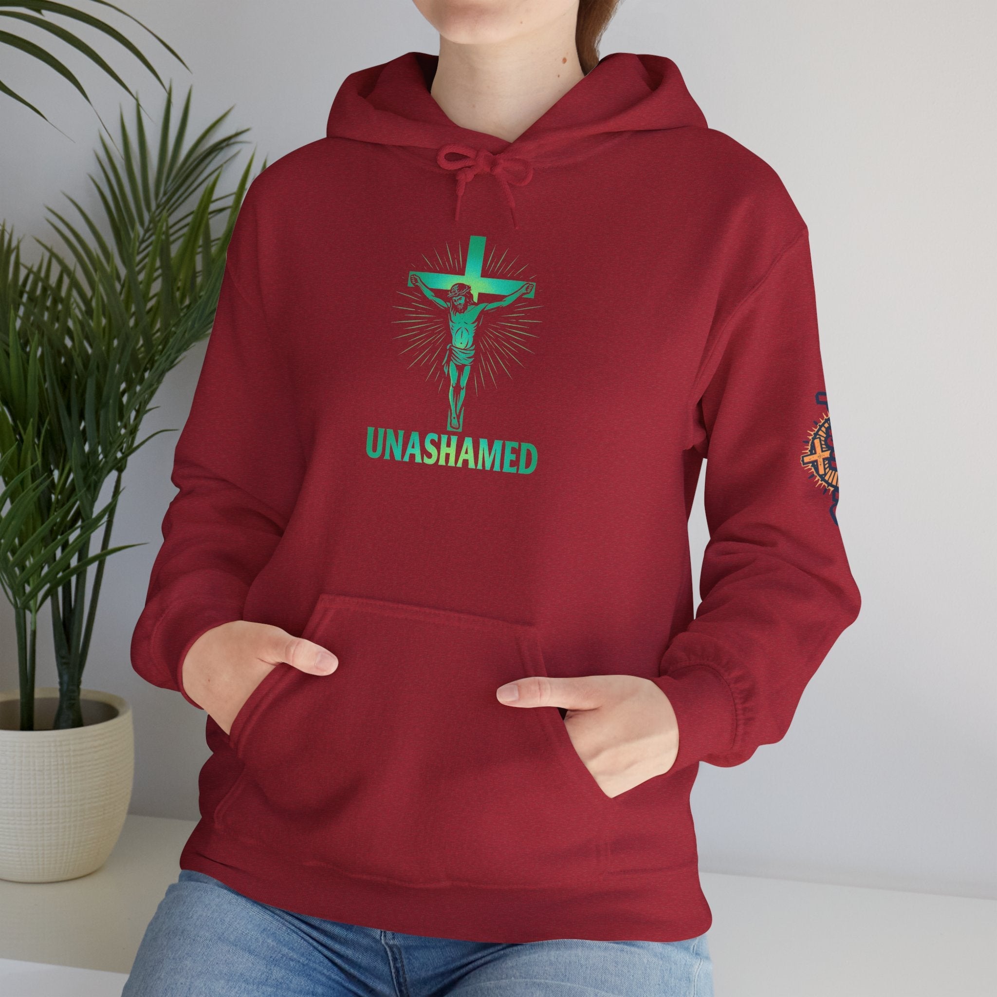 Unashamed Hoodie – Romans 1:16 Crucifixion Christian Hoodie for Bold Unwavering Faith Printify