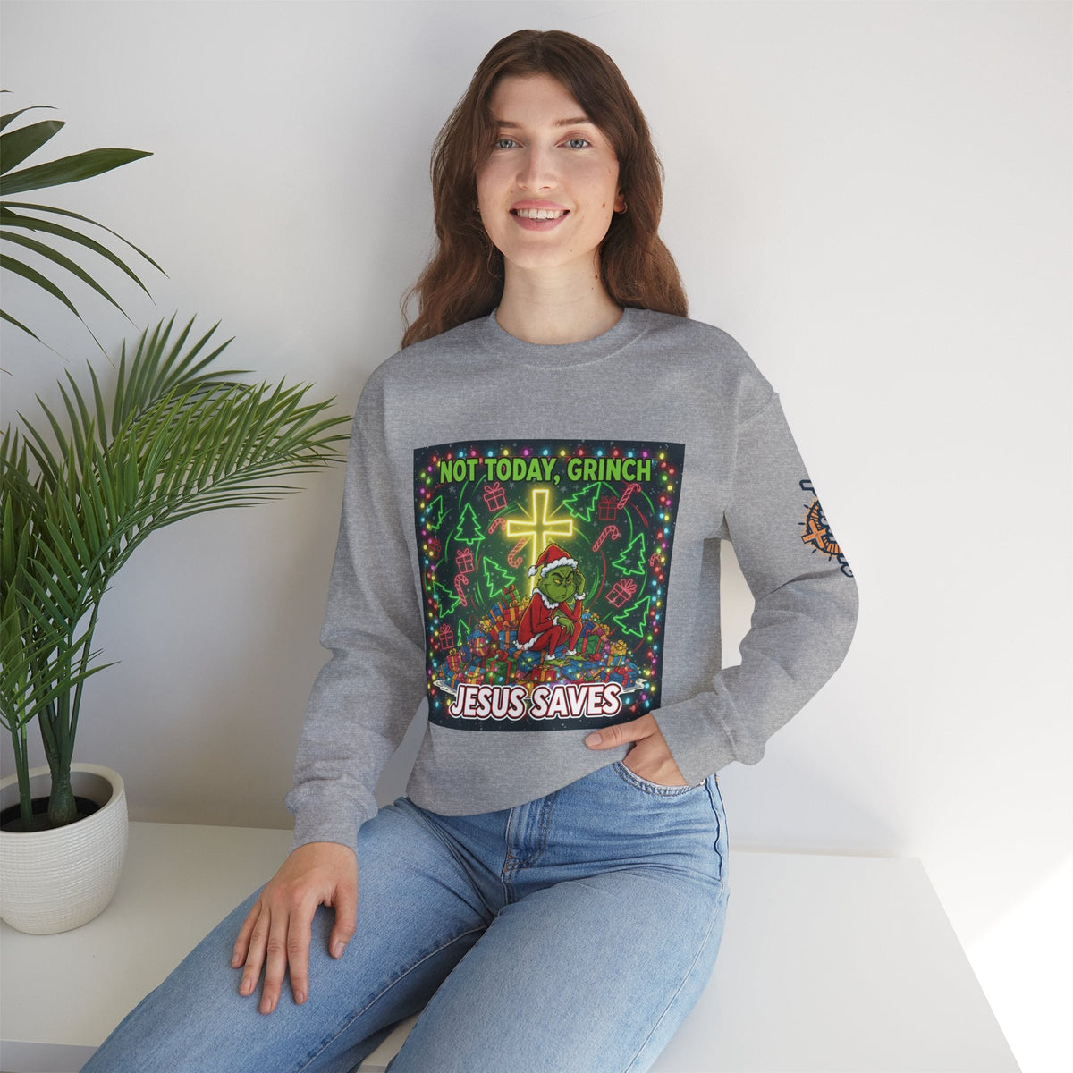 🎄 Not Today, Grinch – Jesus Saves | Funny Christian Christmas Sweatshirt | Festive Green & Red Cartoon Style | Bold Faith Holiday Tee by Uplifted Gear Printify