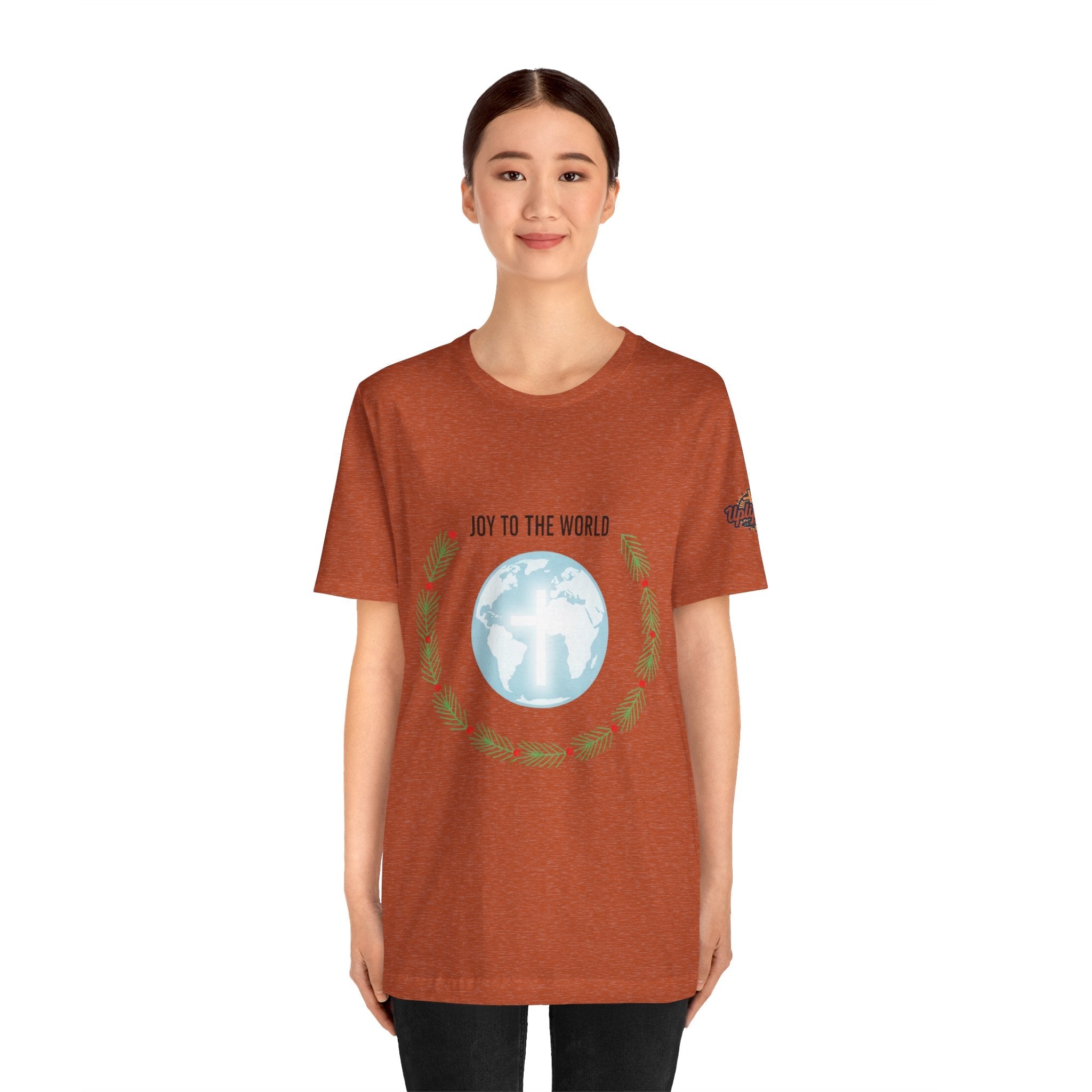 Joy to the World T-shirt – Wreath Earth Nativity Christian Christmas T-shirt for Isaiah 9:6 Holiday Faith & Festive Joy Printify
