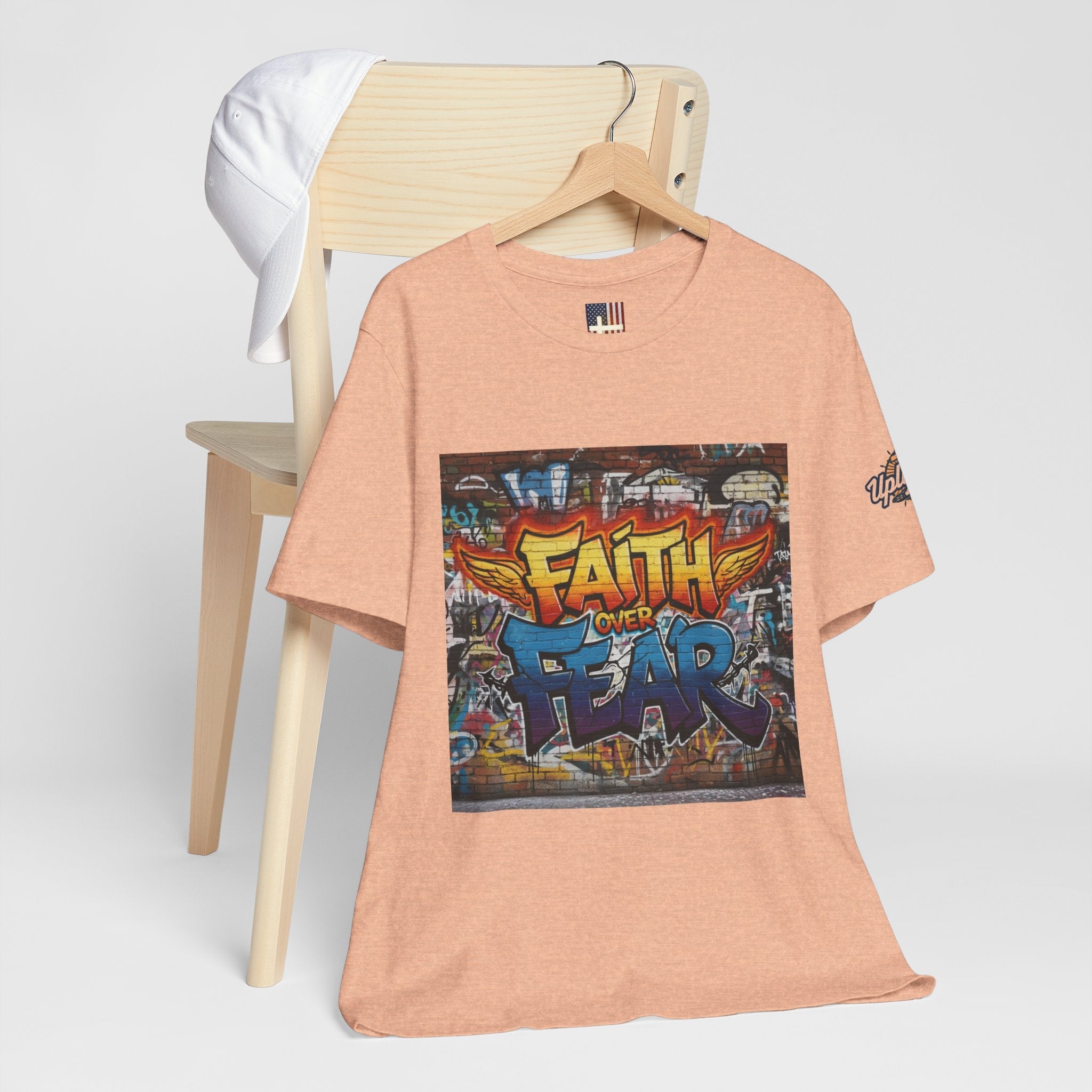 Faith Over Fear T-shirt – Graffiti Wall Christian T-shirt for Bold 2 Corinthians 5:7 Streetwear & Unshakable Faith Printify