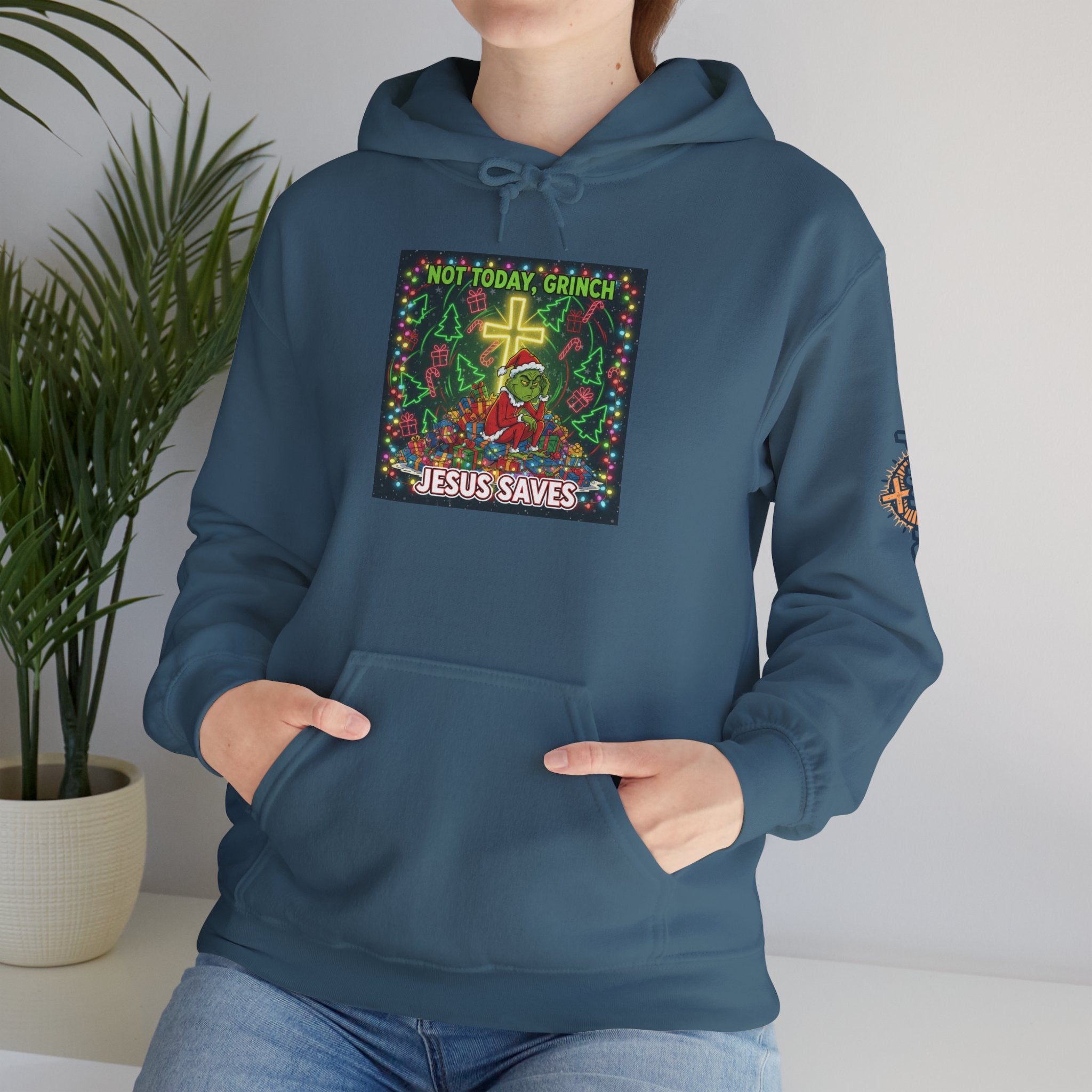 🎄 Not Today, Grinch – Jesus Saves | Funny Christian Christmas Hoodie | Festive Green & Red Cartoon Style | Bold Faith Holiday Tee by Uplifted Gear Printify