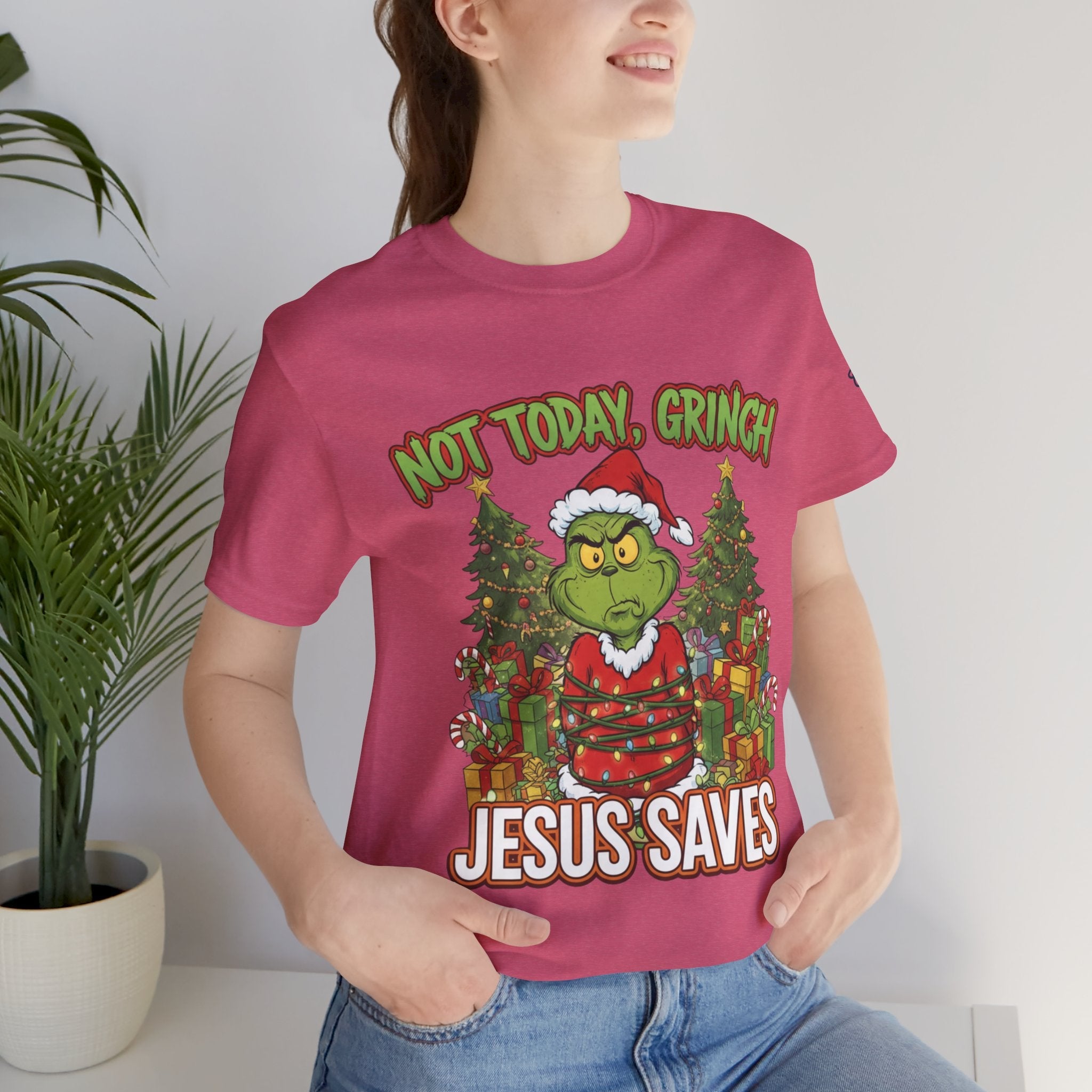 🎄 Not Today, Grinch – Jesus Saves | Funny Christian Christmas T-Shirt | Sulking Grinch & Glowing Cross | Bold Neon Faith Tee by Uplifted Gear Printify