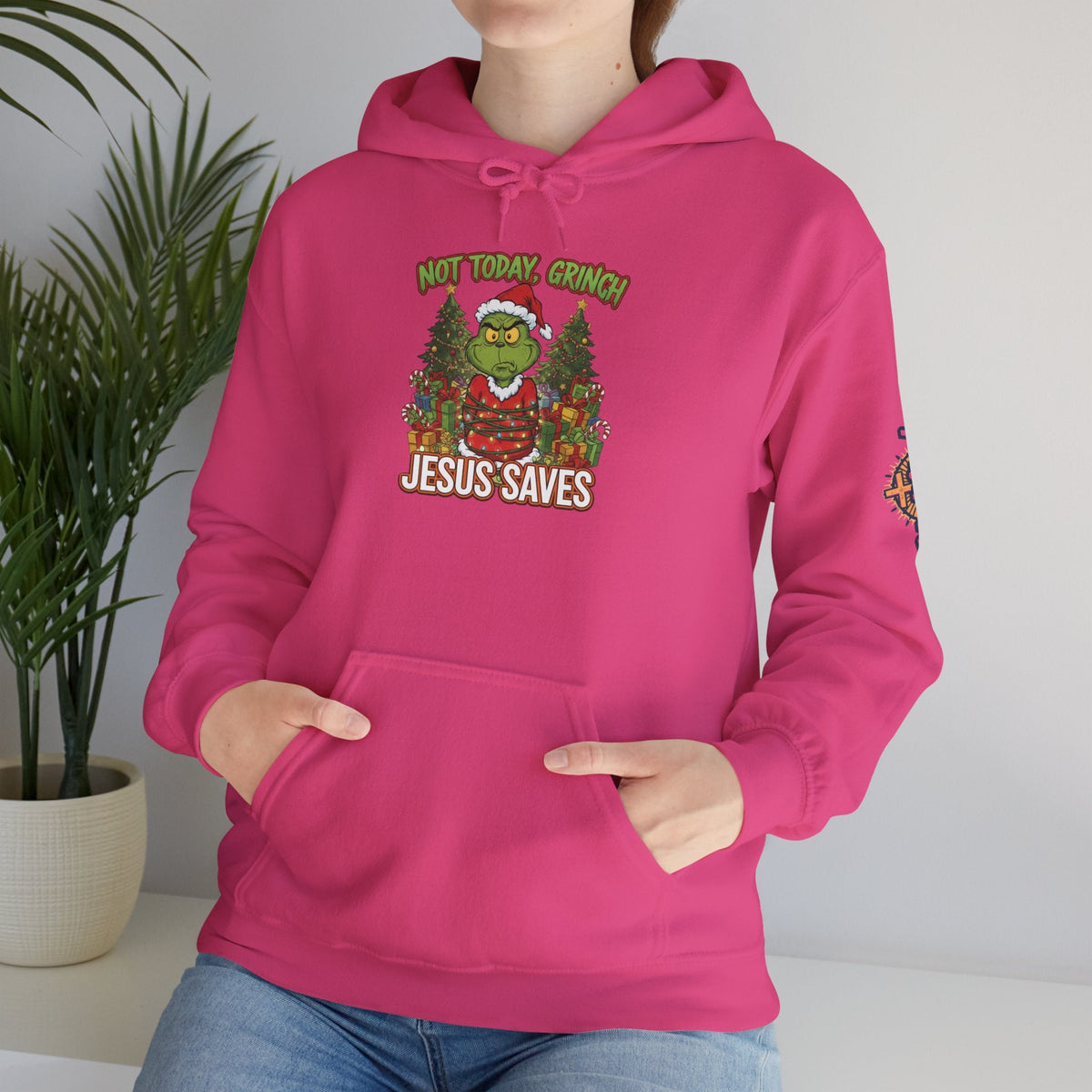 🎄 Not Today, Grinch – Jesus Saves | Funny Christian Christmas Hoodie | Sulking Grinch & Glowing Cross | Bold Neon Faith Tee by Uplifted Gear Printify