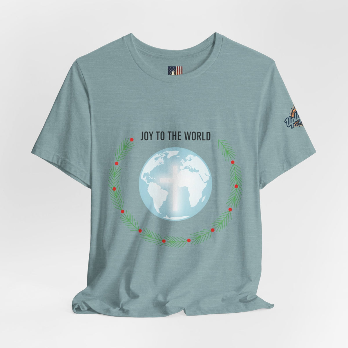 Joy to the World T-shirt – Wreath Earth Nativity Christian Christmas T-shirt for Isaiah 9:6 Holiday Faith & Festive Joy Printify