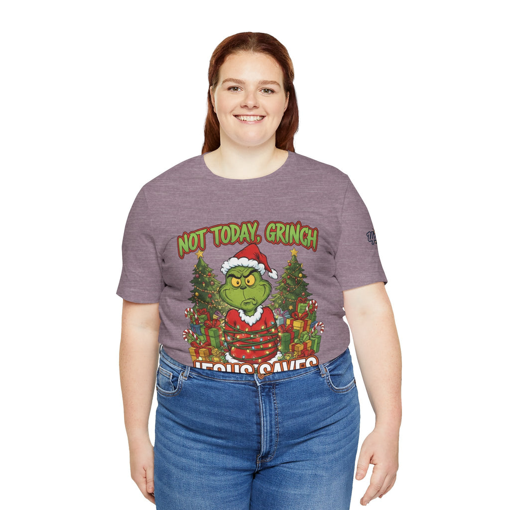 🎄 Not Today, Grinch – Jesus Saves | Funny Christian Christmas T-Shirt | Sulking Grinch & Glowing Cross | Bold Neon Faith Tee by Uplifted Gear Printify