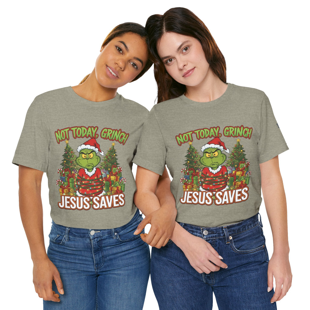 🎄 Not Today, Grinch – Jesus Saves | Funny Christian Christmas T-Shirt | Sulking Grinch & Glowing Cross | Bold Neon Faith Tee by Uplifted Gear Printify
