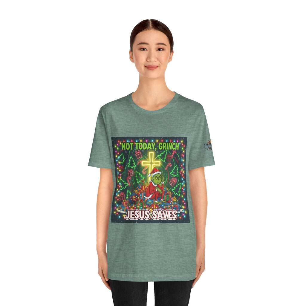 🎄 Not Today, Grinch – Jesus Saves | Funny Christian Christmas T-Shirt | Festive Green & Red Cartoon Style | Bold Faith Holiday Tee by Uplifted Gear Printify