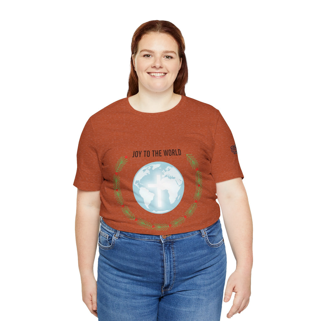 Joy to the World T-shirt – Wreath Earth Nativity Christian Christmas T-shirt for Isaiah 9:6 Holiday Faith & Festive Joy Printify