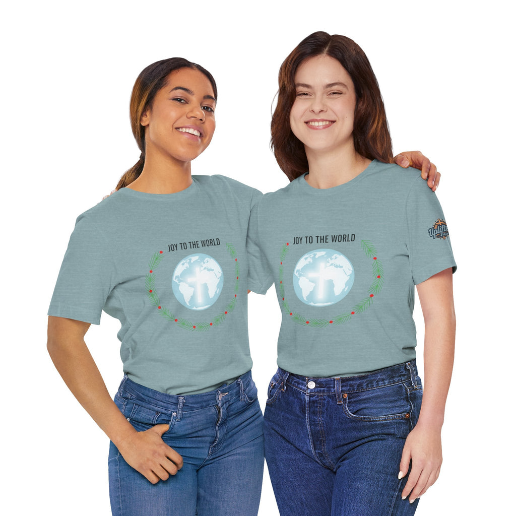 Joy to the World T-shirt – Wreath Earth Nativity Christian Christmas T-shirt for Isaiah 9:6 Holiday Faith & Festive Joy Printify