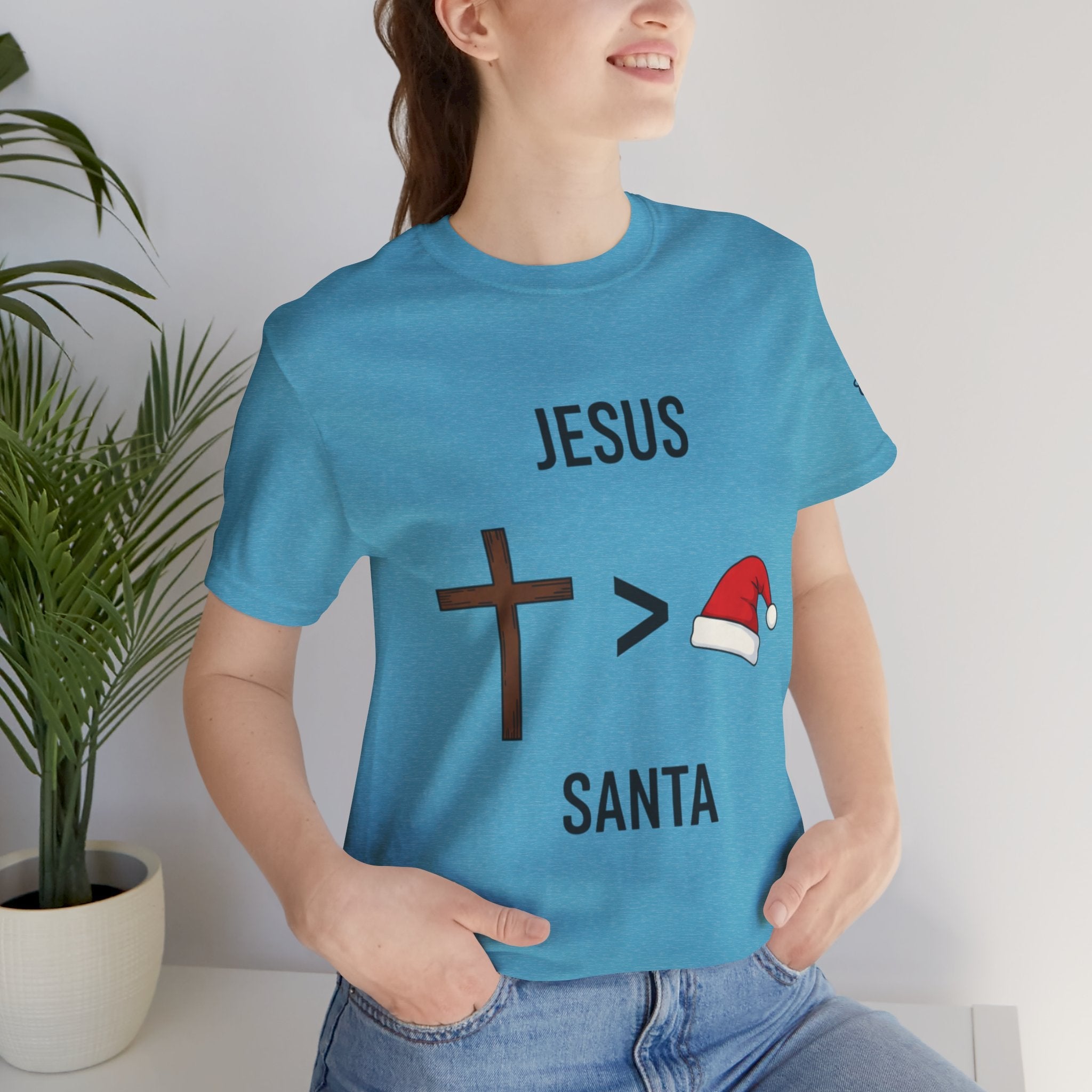 🎄 Jesus > Santa – Minimalist Christian Christmas T-Shirt | Bold Faith Over Holiday Tee | Cross vs Santa Hat Design | Uplifted Gear Printify