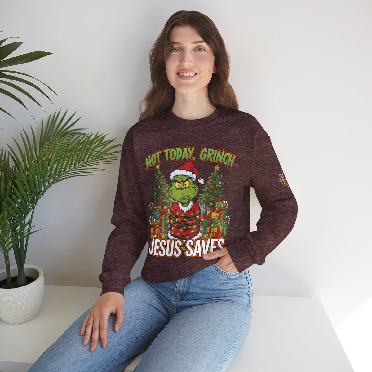 🎄 Not Today, Grinch – Jesus Saves | Funny Christian Christmas Sweatshirt | Sulking Grinch & Glowing Cross | Bold Neon Faith Tee by Uplifted Gear Printify