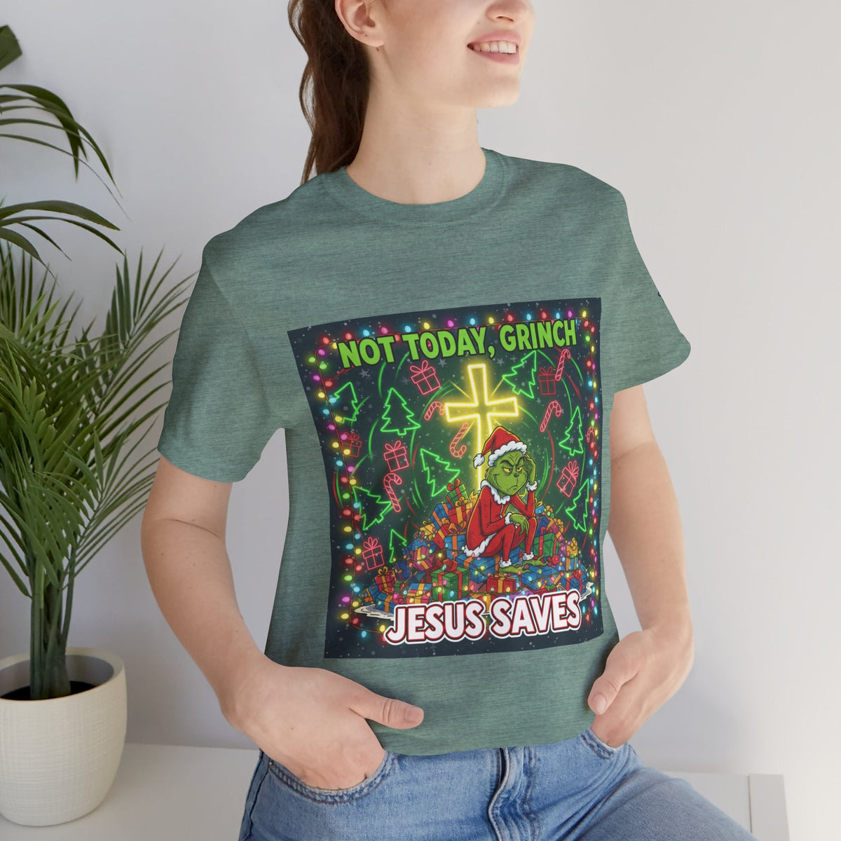 🎄 Not Today, Grinch – Jesus Saves | Funny Christian Christmas T-Shirt | Festive Green & Red Cartoon Style | Bold Faith Holiday Tee by Uplifted Gear Printify