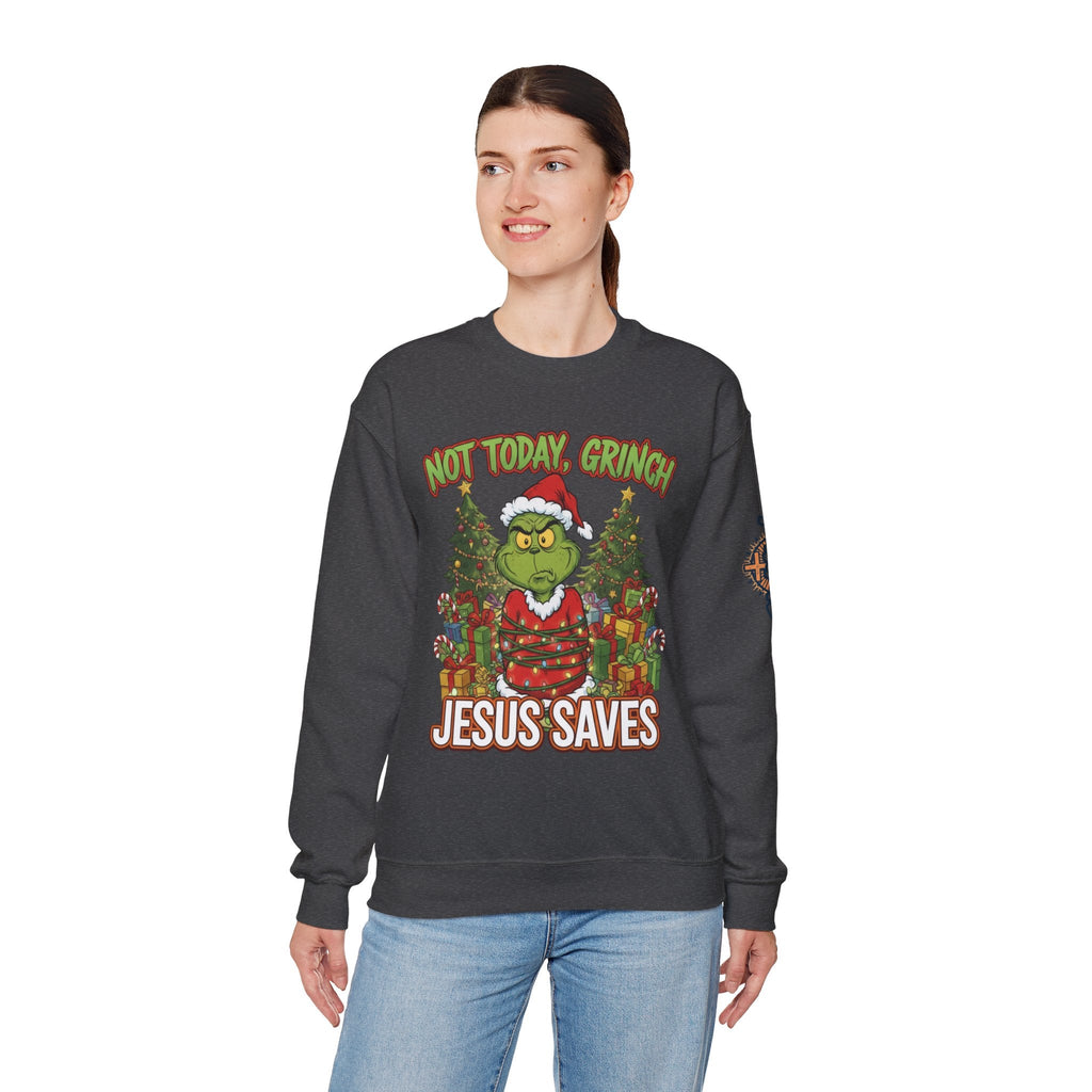 🎄 Not Today, Grinch – Jesus Saves | Funny Christian Christmas Sweatshirt | Sulking Grinch & Glowing Cross | Bold Neon Faith Tee by Uplifted Gear Printify