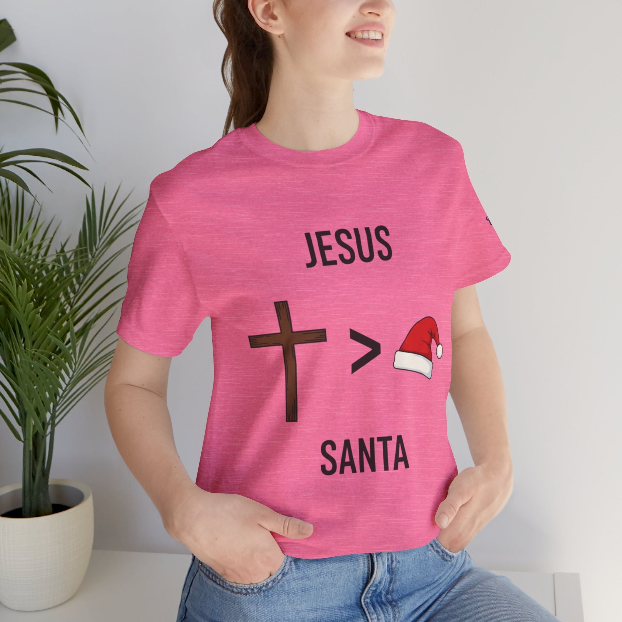 🎄 Jesus > Santa – Minimalist Christian Christmas T-Shirt | Bold Faith Over Holiday Tee | Cross vs Santa Hat Design | Uplifted Gear Printify